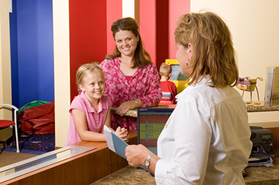 Child at Front Desk at the Pediatric Dentist Office in Gilbert, Mesa and Chandler, AZ